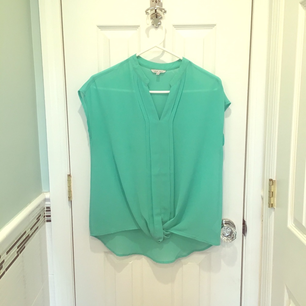 Sheer green blouse w pleated design.